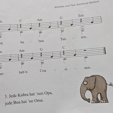 music-sheet with an elephant pictured on it